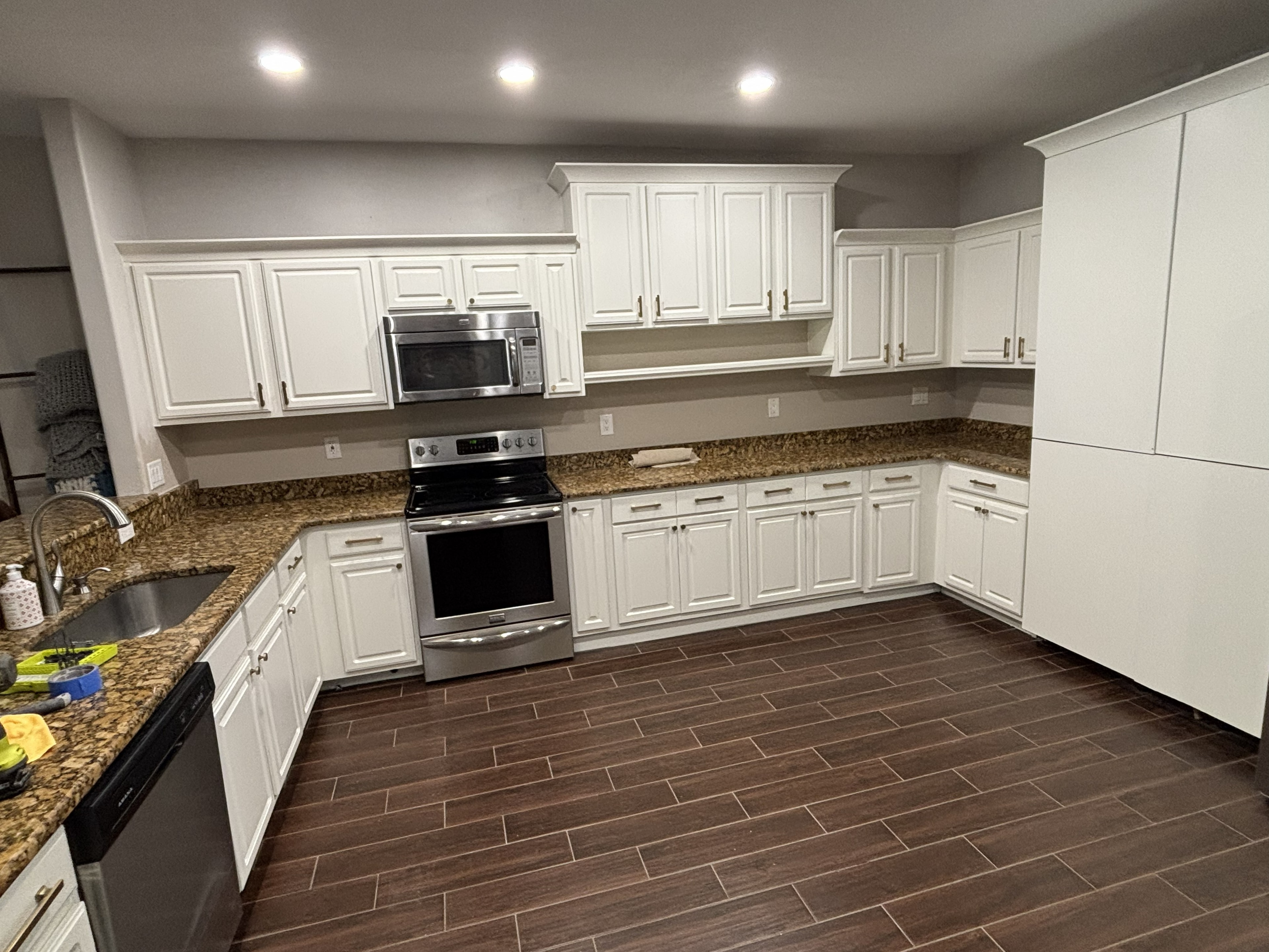 Cabinet Repaint — Finished (Appliance Side)